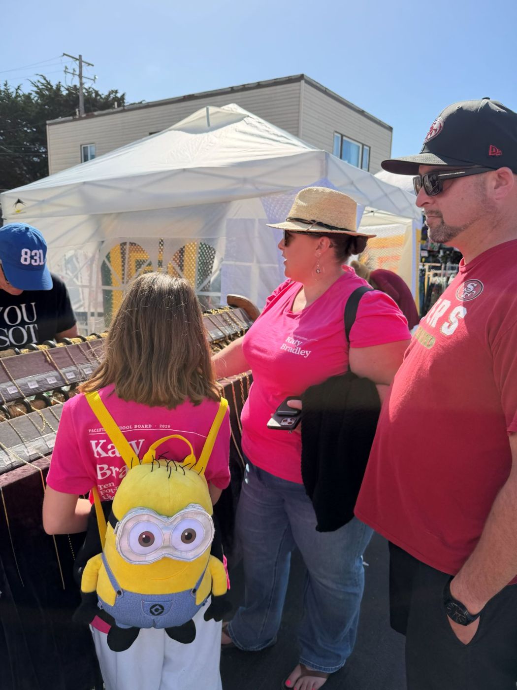 Katy Bradley and her family in campaign t-shirts at Pacifica Fog Fest